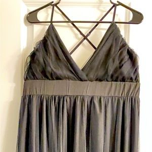 Tulle dress with two thigh high slits in the front